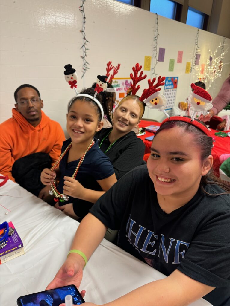The SAGE Center was filled with holiday cheer as families came together to celebrate the season with laughter, games, and delicious food. The event created a joyful and welcoming space for connection, reflection, and shared celebration. We extend our heartfelt thanks to Tijuana Jones, Housing Case Manager, for generously providing food for all to enjoy, and to Dr. Gainers and her Delta Sorority sisters for their extraordinary generosity. From thoughtful gifts to luxury items, including designer coats and jewelry, their contributions helped make this holiday season truly memorable for the families we serve. Thank you to everyone who played a role in making this celebration so special. Your kindness and support continue to strengthen our community and bring joy to our families.